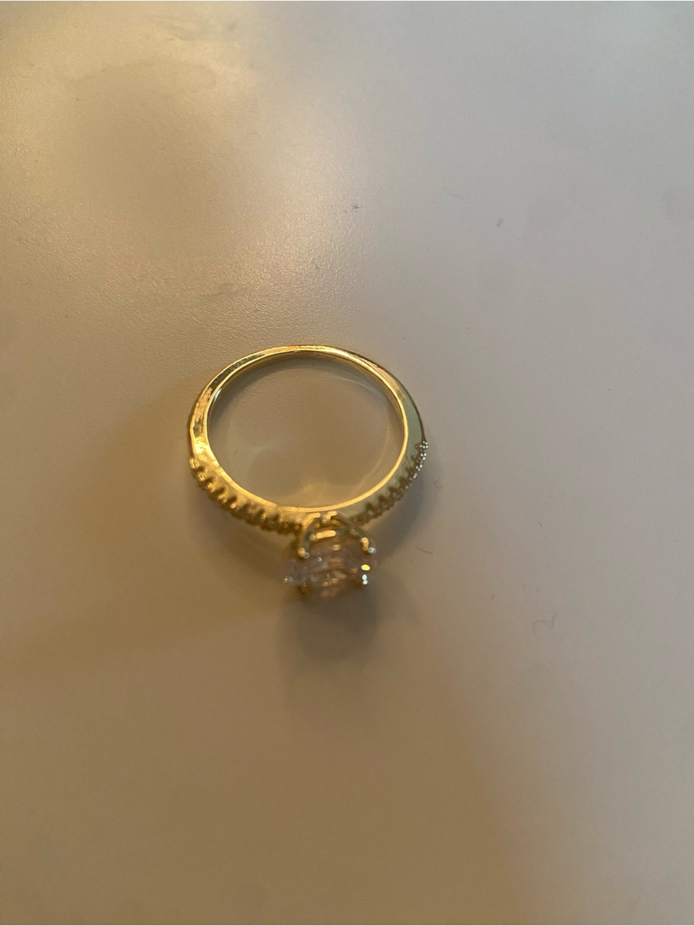Gold Engagement-Style Ring with Clear Solitaire Stone